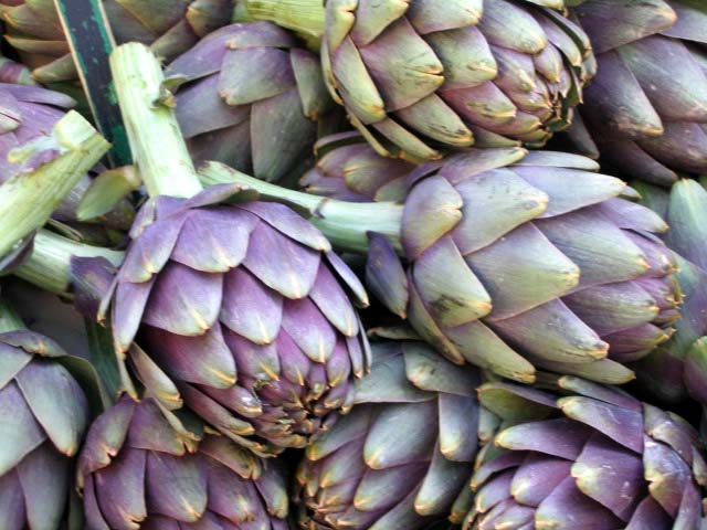 Bloemkool en artisjokken, met kreeft en Jacobsschelpen.